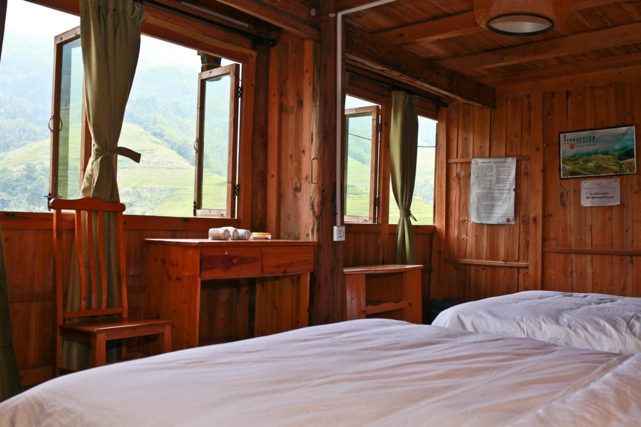 Dragon'S Den Hostel Longsheng Exterior photo